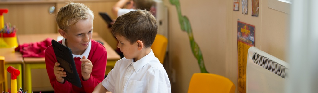 Primary school students using tablet